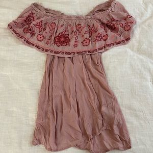 Off the shoulder flower shirt.
